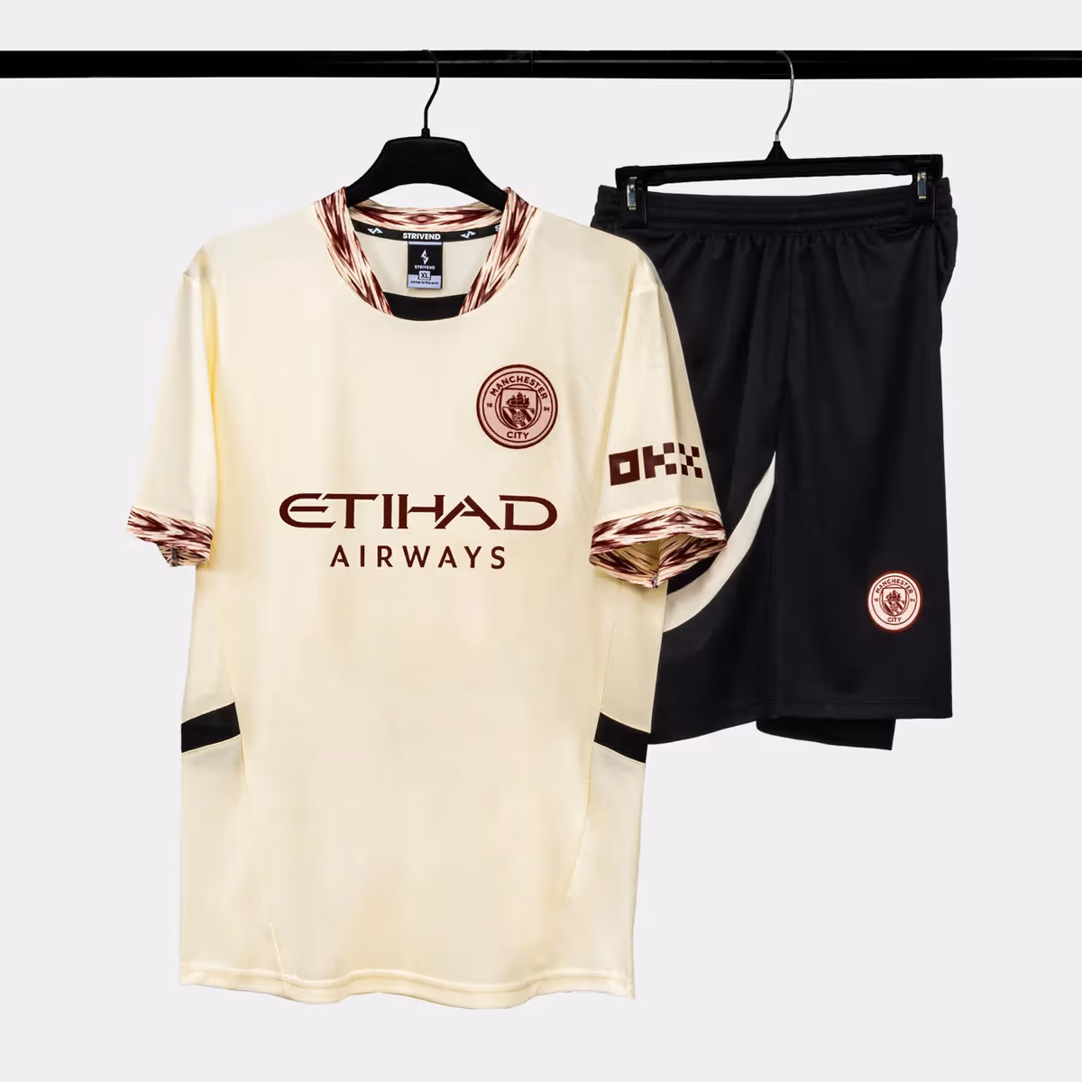 Bộ Quần Áo Bóng Đá Strivend Manchester City Kem 24/25